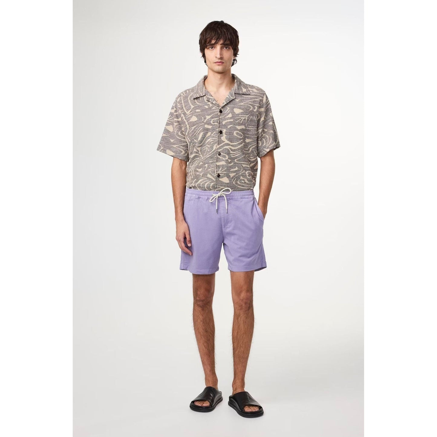 Men's Gregor Lyocell Blend Shorts in violet by NN07, featuring a relaxed fit and casual style, shown on a model.