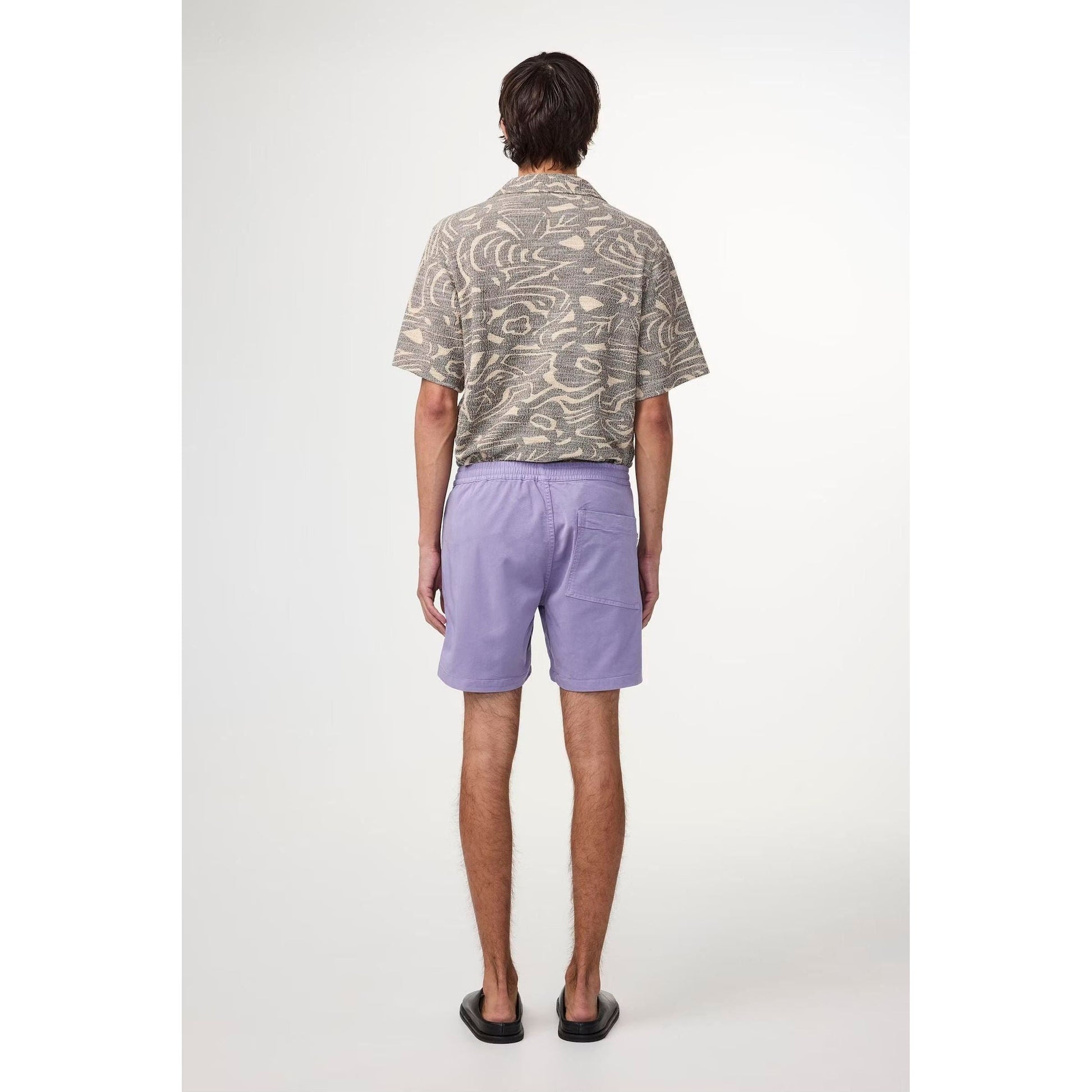 Men's NN07 Gregor Lyocell blend shorts in violet, showcasing the lightweight fabric and casual fit on a model.