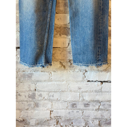 Women's 13.5oz dark distressed selvedge denim narrow straight cut jeans by Chimala, showing fit and detailed dark wash fabric.