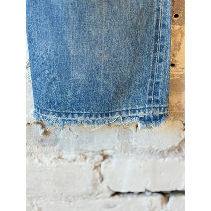 Women's 13.5oz dark distressed selvedge denim jeans by Chimala with narrow straight cut and stylish distressed details.