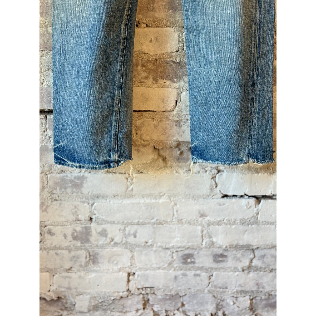 Women's 13.5oz Selvedge Denim used ankle cut jeans by Chimala with medium distress and faded detailing.