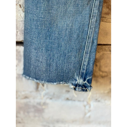 Women's 13.5oz Chimala selvedge denim ankle jeans with medium distress, showcasing a fitted silhouette and distressed details.
