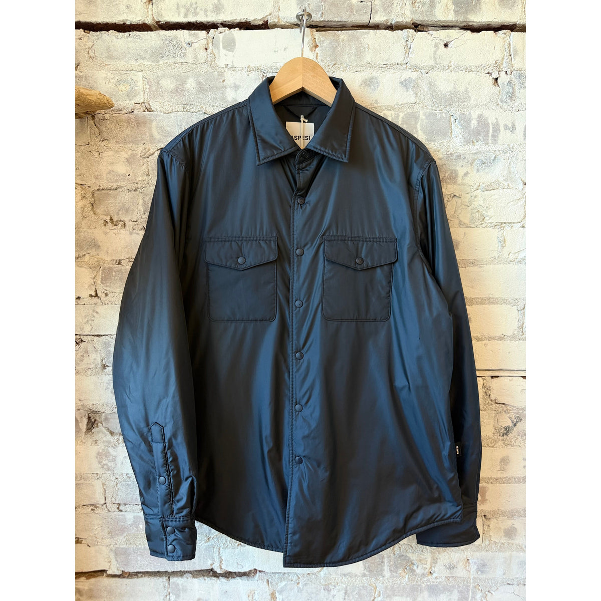 Men's navy 13 Piu shirt by Aspesi, featuring a classic fit with button-down collar and long sleeves, laid flat.