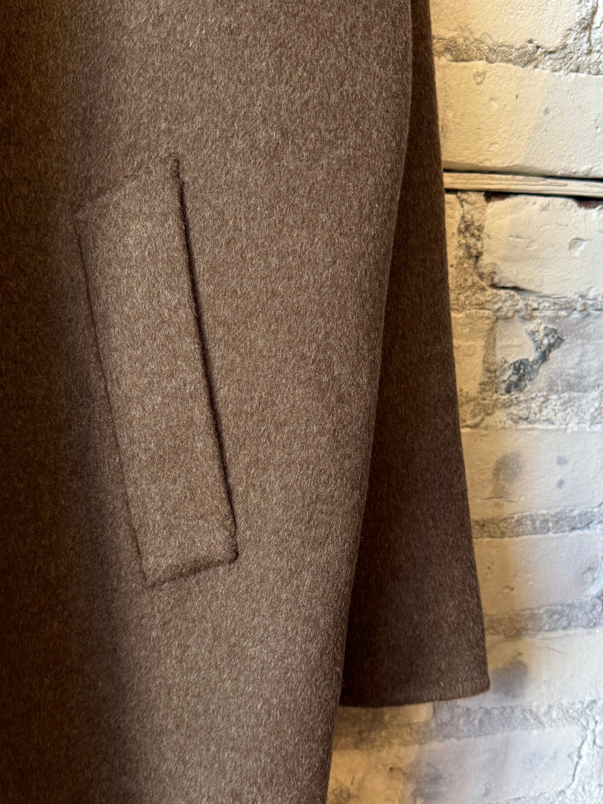 Hartford Men's Graig Woven Coat in nut color, showcasing the stylish woven fabric and tailored fit on a mannequin.