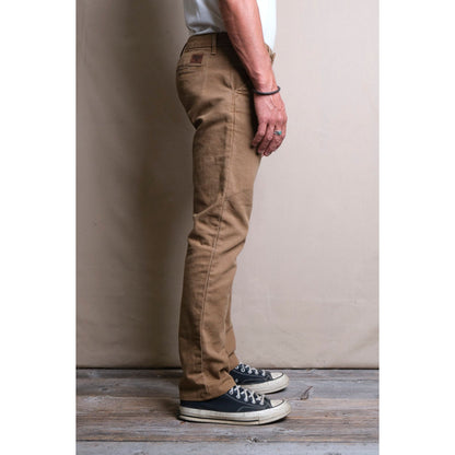 Men's 14 oz tan slub cotton worker's chino pants by Freenote Cloth, featuring a relaxed fit and durable fabric.