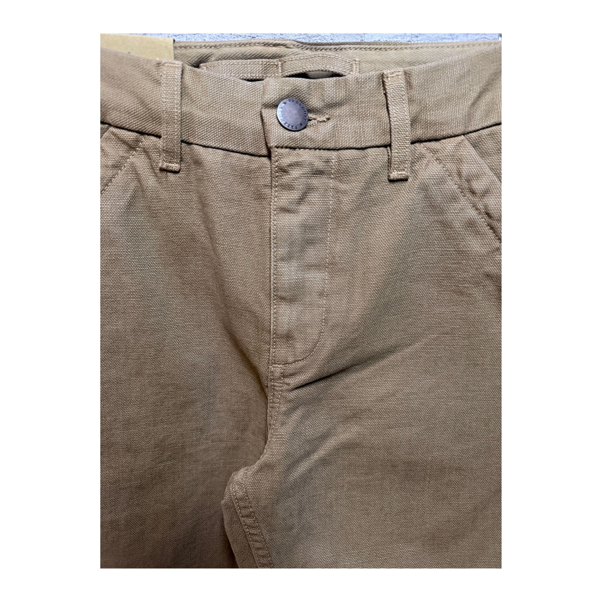 Men's 14-ounce tan slub worker's chino pants by Freenote Cloth, showing the fabric texture and classic fit.