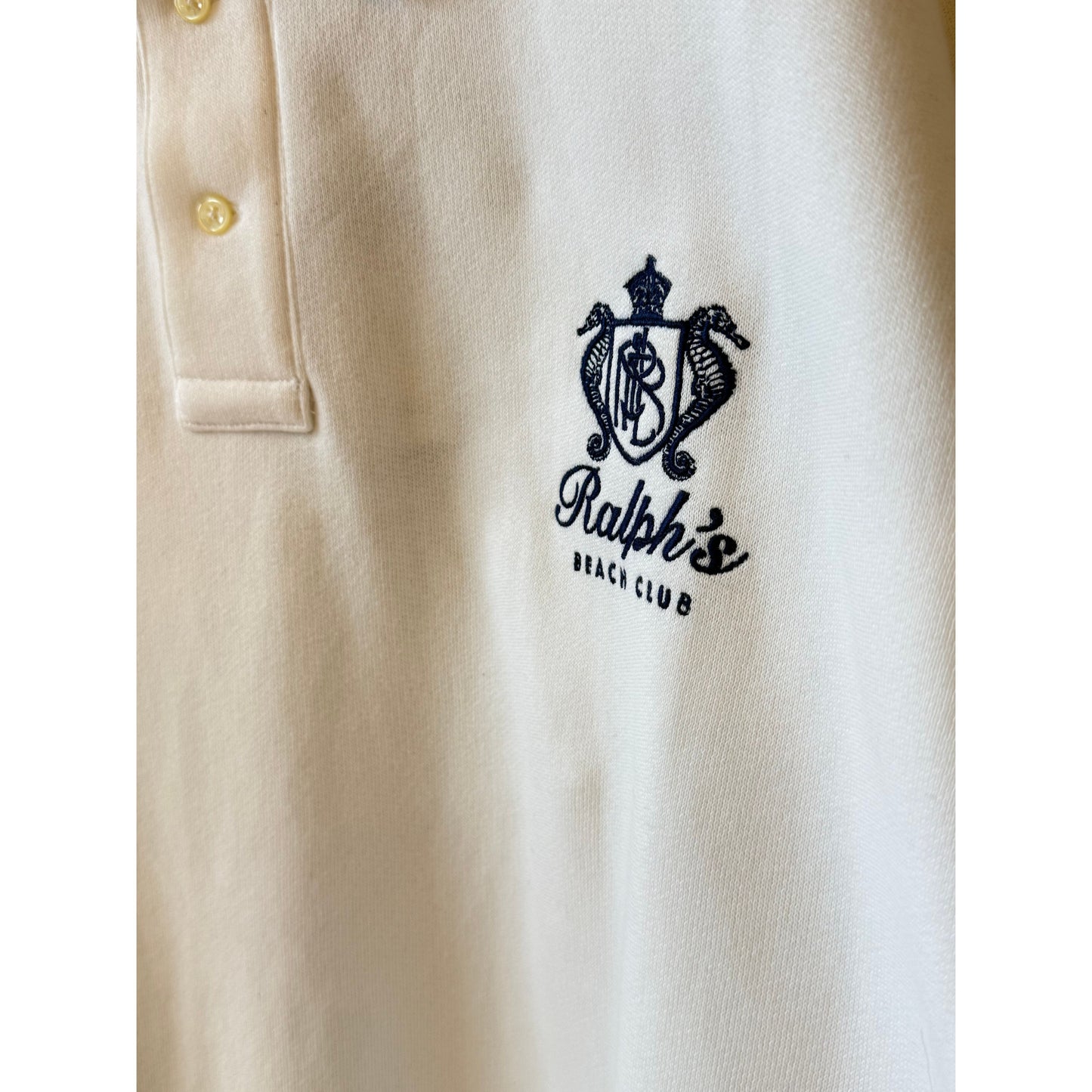 Men's white Polo RL Island Fleece graphic print polo sweatshirt with a casual fit and vibrant island-themed design.