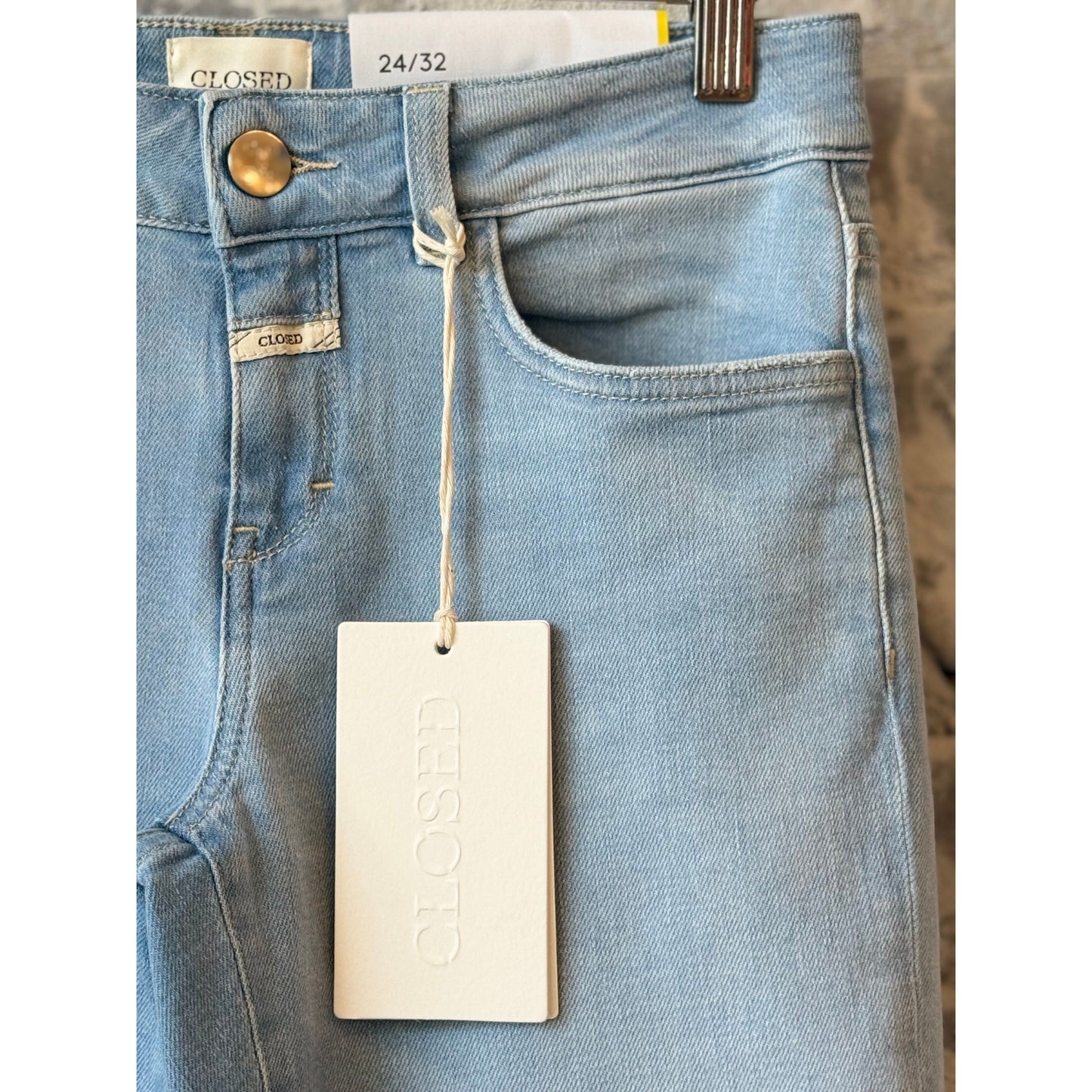 Light blue women's Baker Slim Jean by Closed Women's, fitted denim with classic five-pocket design and slim fit silhouette.