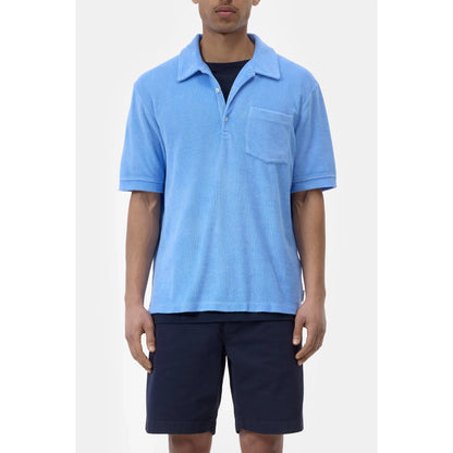 Men's sky blue short sleeve polo shirt by Closed Men's, showing a classic fit with collar and button placket.