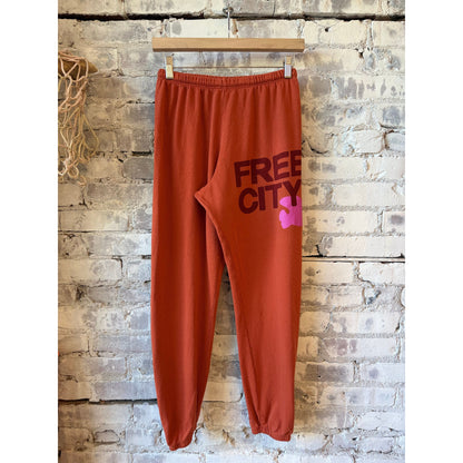 Freecity women's large burn orange sweatpant, cozy and relaxed fit, showcasing the comfortable fabric and casual style.