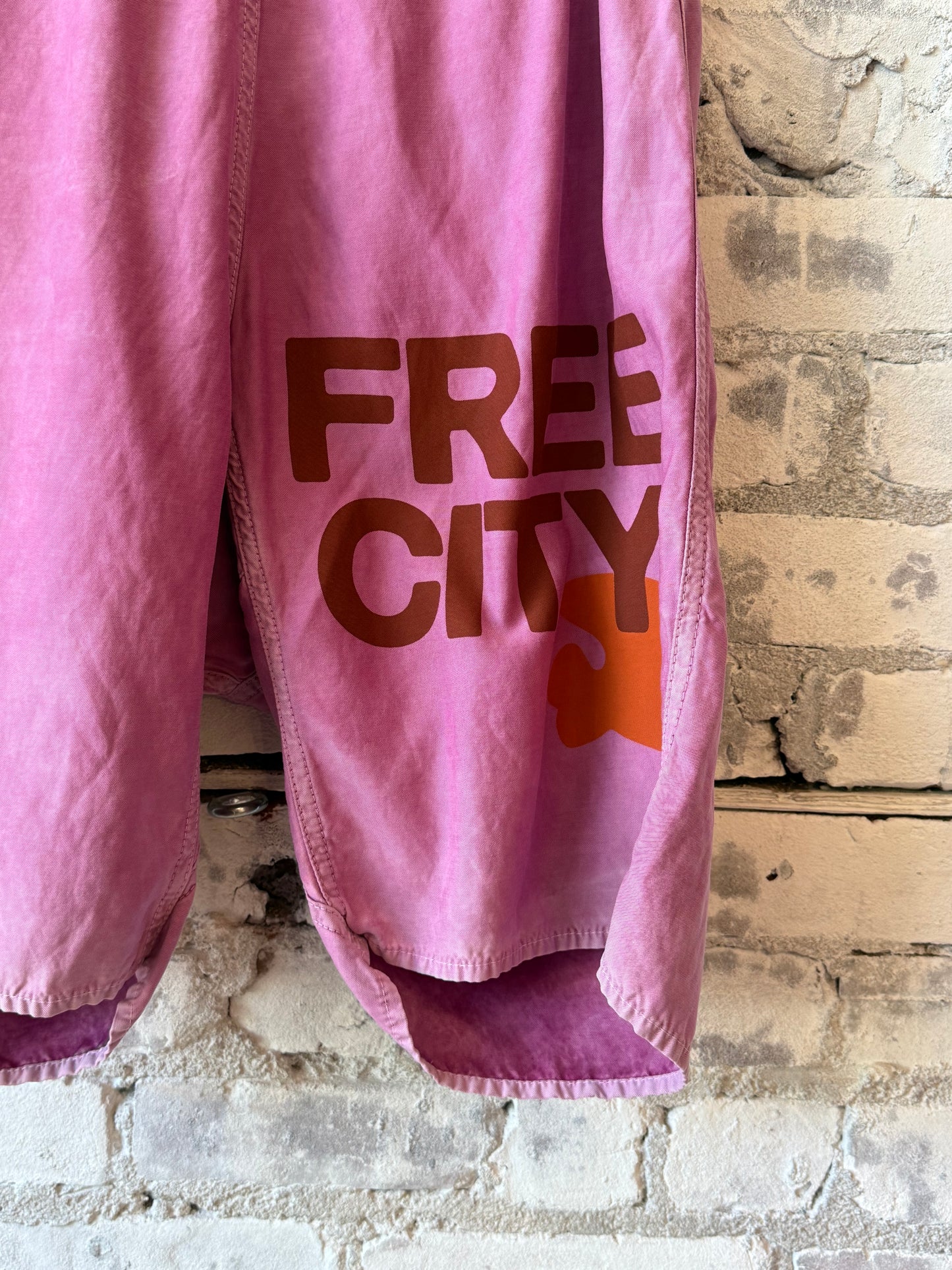 Women's Freecity matte satin back pocket shorts in Pinkshroom Powder, featuring a stylish and comfortable design.
