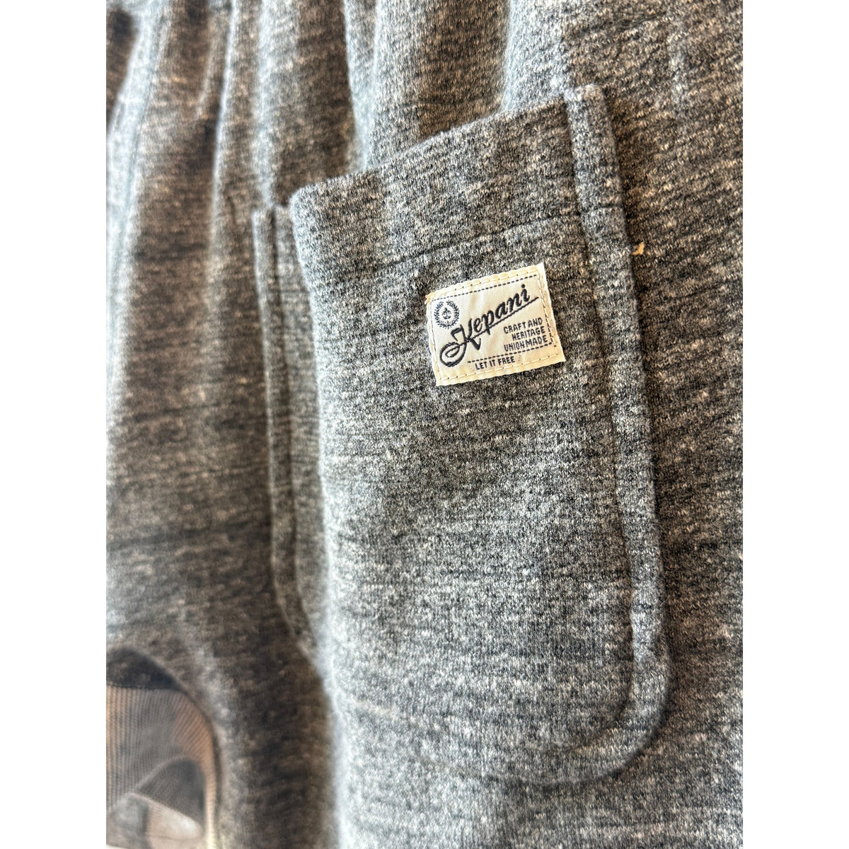 Men's gray Raffy fleece sweat shorts by Kepani, featuring a comfortable elastic waistband and relaxed fit.
