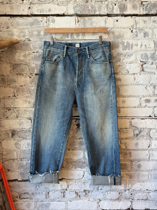 Women's 12oz selvedge denim wide tapered cut jeans by Chimala in medium vintage wash, showing the fit and fabric texture.