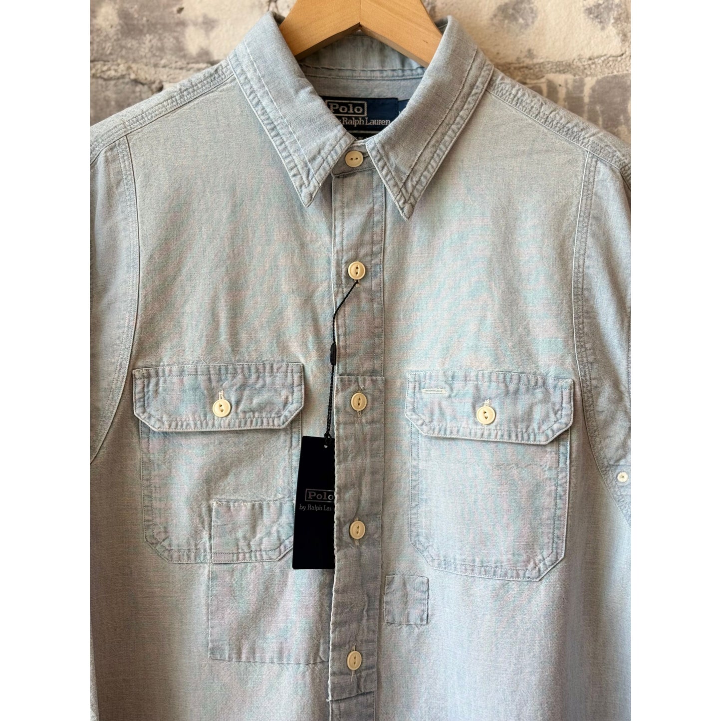 Men's Polo RL Chambray Compass Workshirt in medium indigo, featuring a button-up design and classic collar, laid flat.