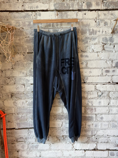 Women's Freecity large Sunfades Pocket Sweatpant with Moonshrooms print, featuring relaxed fit and side pockets.
