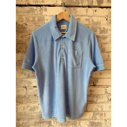 Men's sky blue short sleeve polo shirt by Closed Men's, showing the classic collar and button placket.