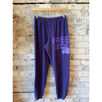 Women's Freecity large purple sweatpants with a floral bush print, casual fit, and comfortable waistband.