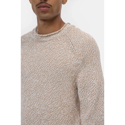 Men's Raw Edged Knit in Rock Beige by Closed Men's, showing close-up of textured knit fabric and raw edge detailing.