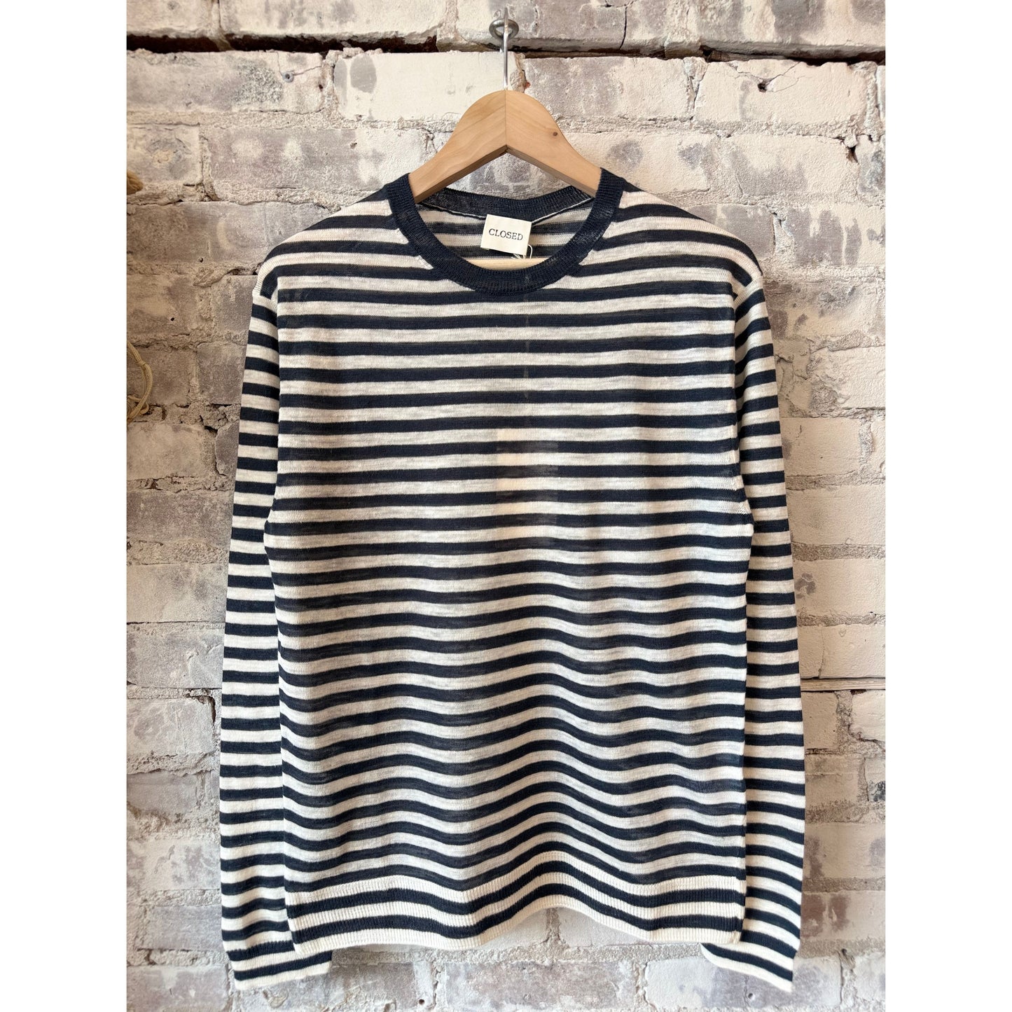 Men's striped crewneck sweater by Closed Men's in Magma Black, featuring a stylish black and white striped pattern.