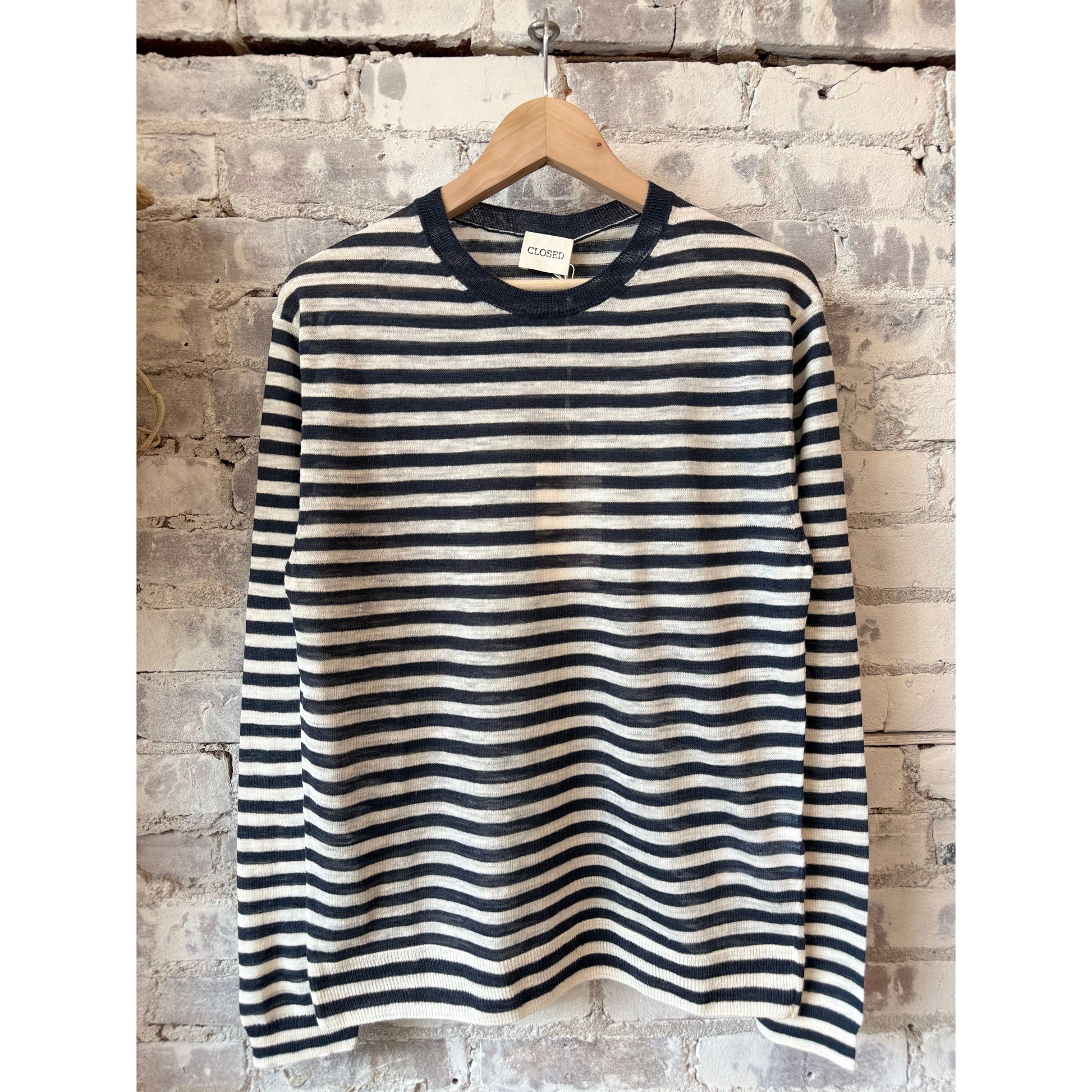 Men's striped crewneck sweater by Closed Men's in Magma Black, featuring a stylish black and white striped pattern.