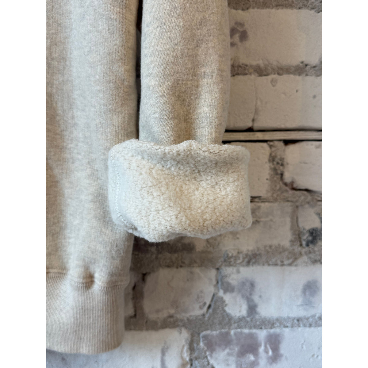 Men's Kepani Manchester 2 Pullover Hoodie in oatmeal, soft fabric, featuring a hood and front pocket, casual and comfortable style.