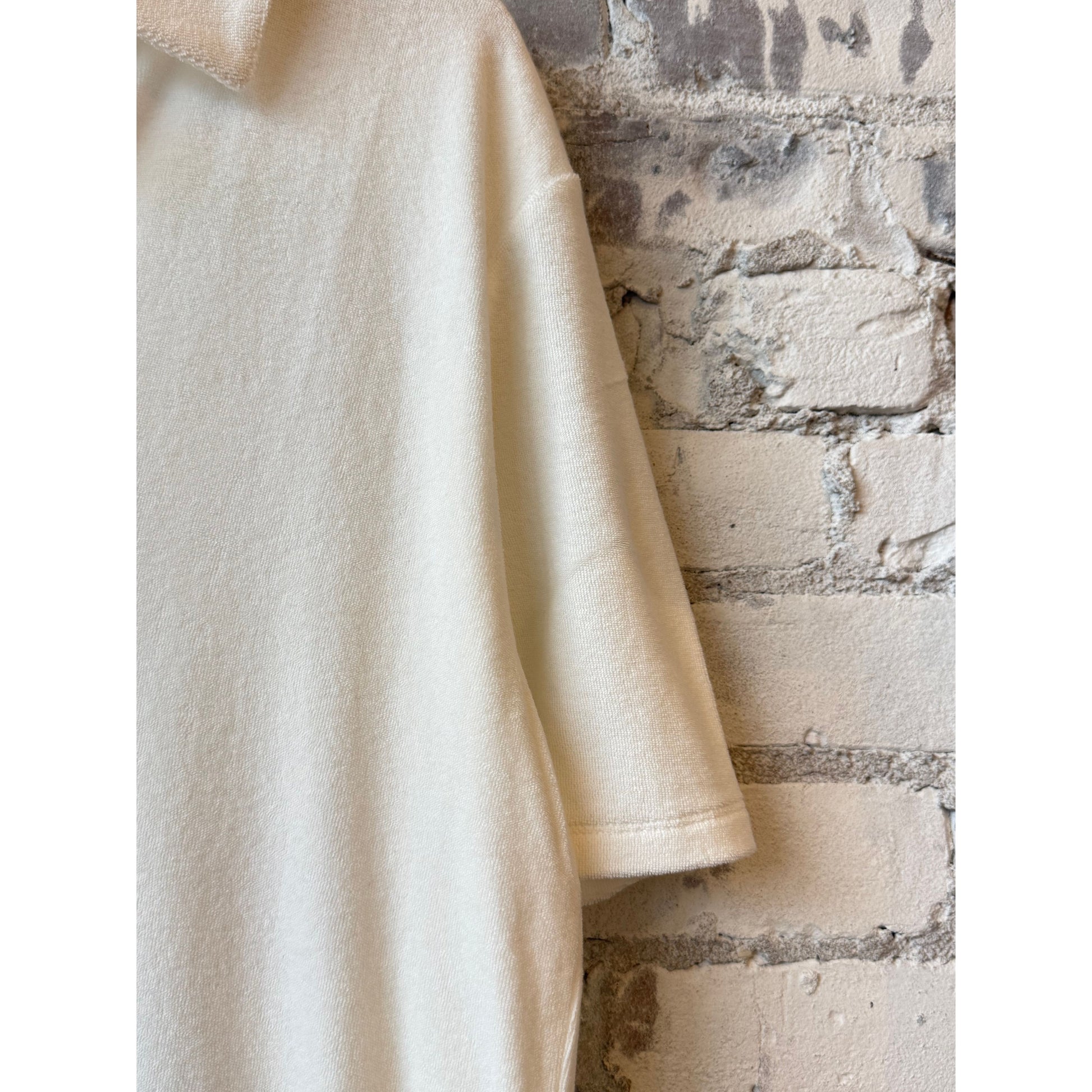 Women's organic cotton terry elbow sleeve polo maxi dress in milk color by Majestic Filatures, featuring a relaxed fit and classic polo details.