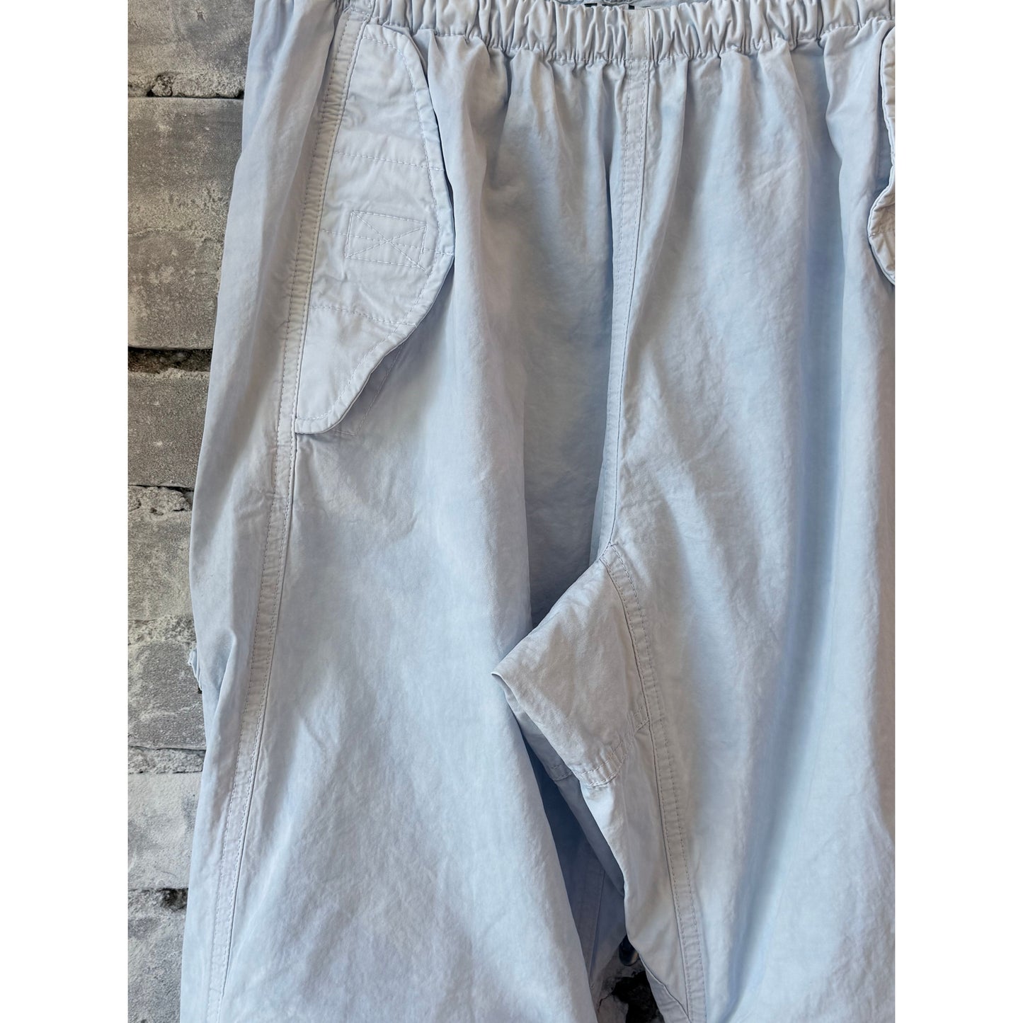 Women's Freecity Outofsight Poplin Air Flap Snap Kite Pant in blue with relaxed fit and functional pockets.
