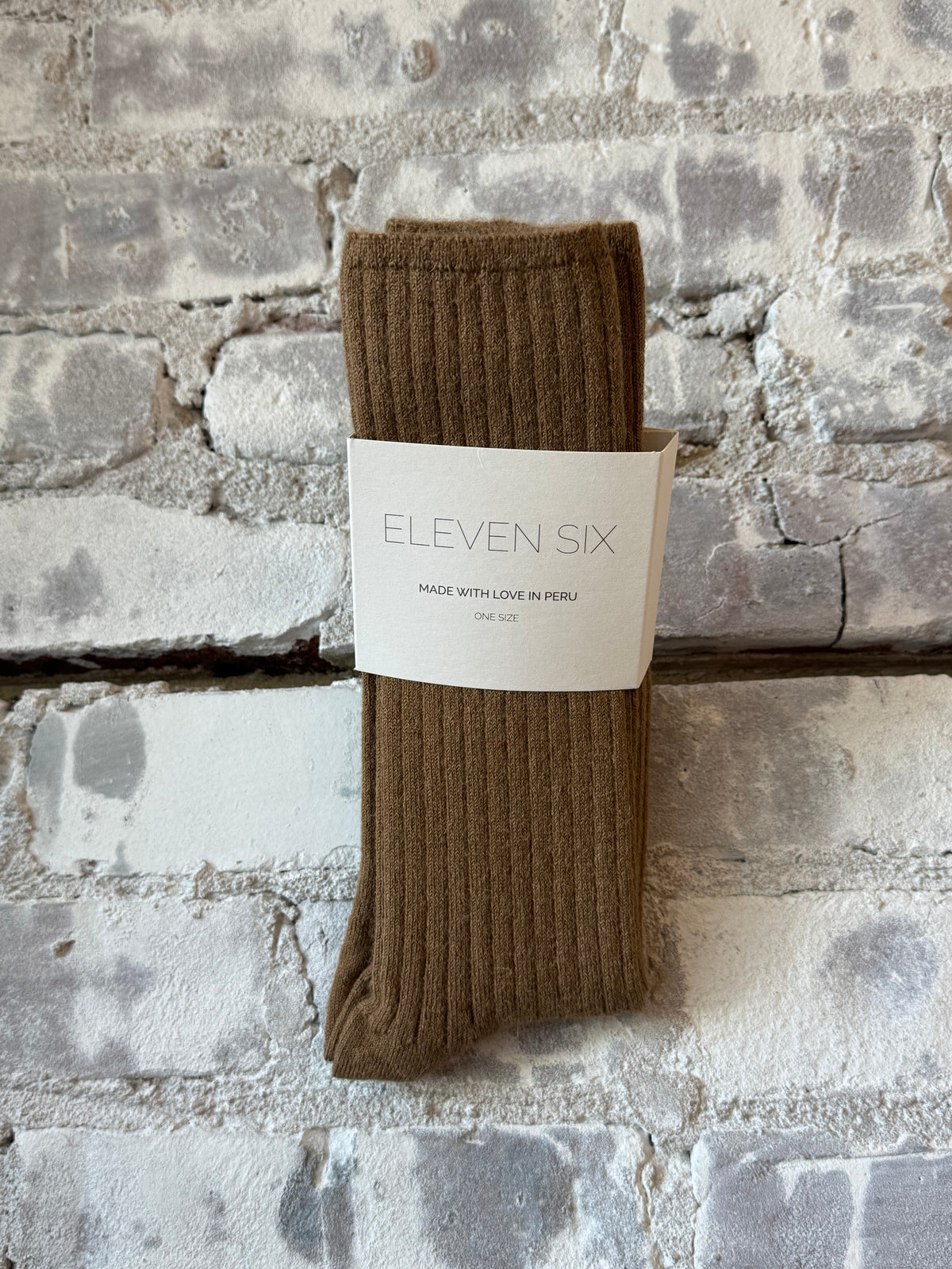 Women's camel ribbed sock by ELEVEN SIX, featuring textured knit pattern and comfortable fit.