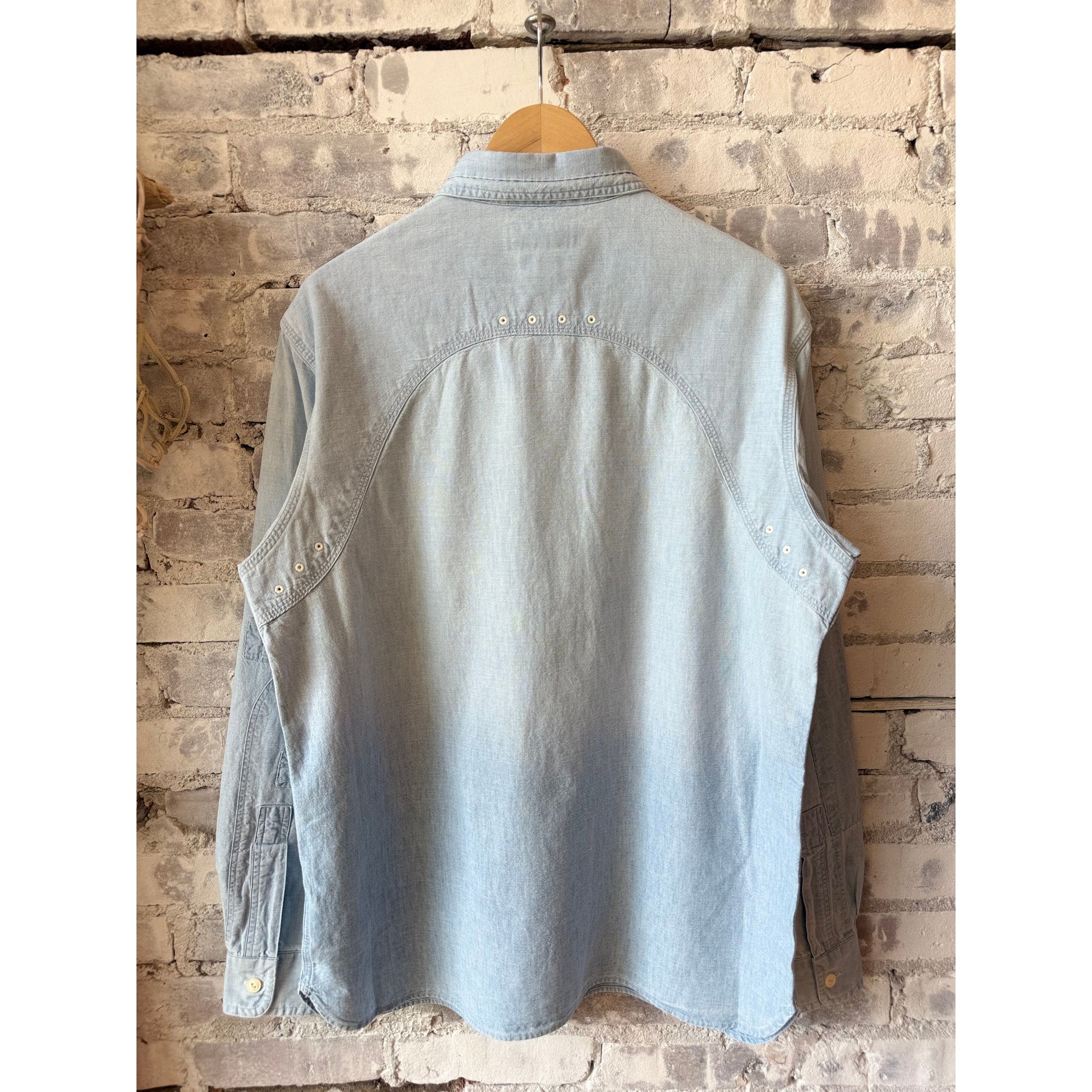 Men's Polo RL Chambray Compass Workshirt in medium indigo, featuring a classic design with a button-down collar and chest pocket.
