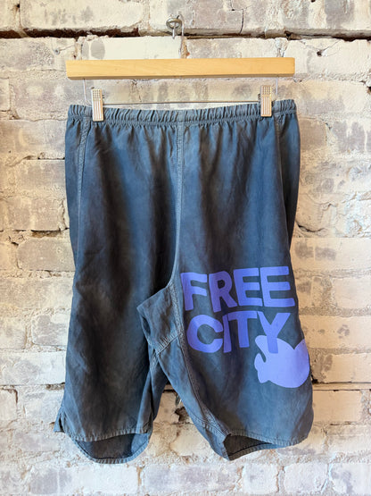 Women's Freecity matte satin back pocket shorts in Moonshrooms Powder color, featuring a relaxed fit and stylish design.