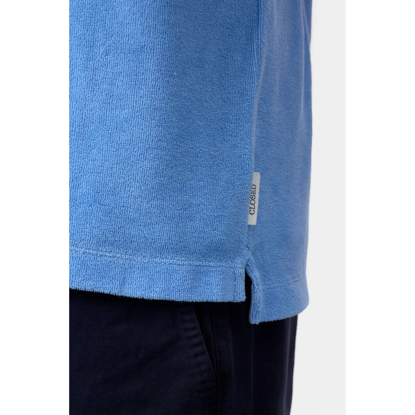 Men's sky blue short sleeve polo shirt by Closed Men's, featuring a classic collar and comfortable fit.