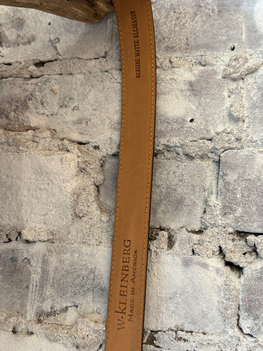 Men's W. Kleinberg 1-1/8" matte alligator leather belt with chocolate brown O-ring buckle, showcasing textured leather and stylish design.