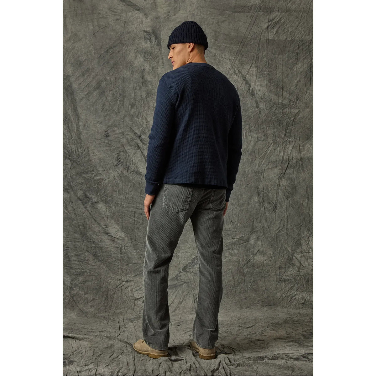 Men's black 5-pocket cord jean by Save Khaki United, showing classic fit and durable fabric with five front and back pockets.