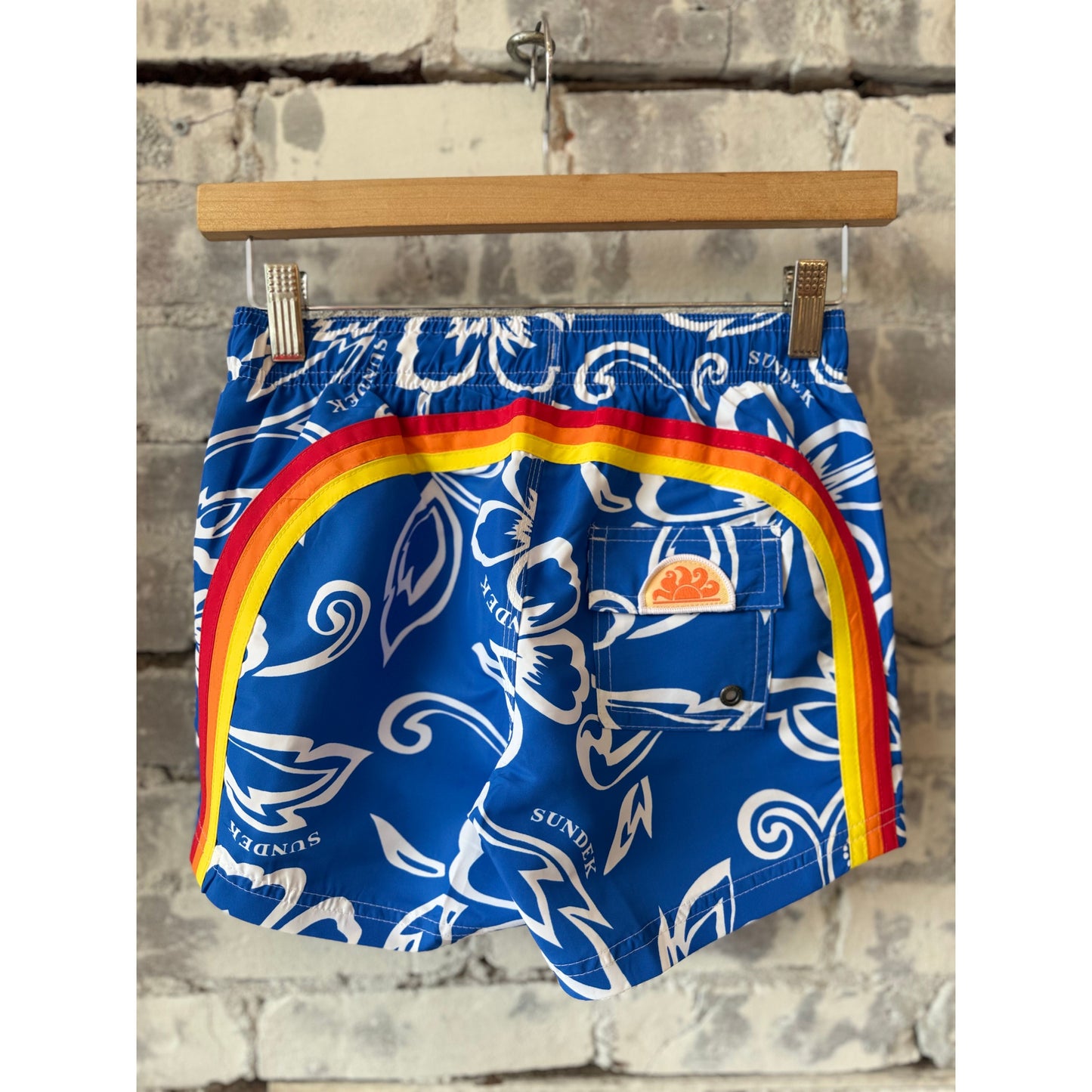 Sundek Kid's Archive Hibiscus print elastic waist boardshort in vintage sapphire with floral design and adjustable waistband.