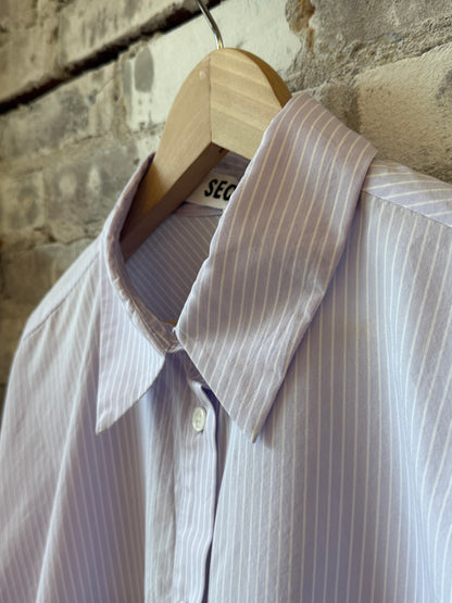 Women's Kelly Shirt Dress in lavender stripe by Secular, featuring a relaxed fit and button-down front.