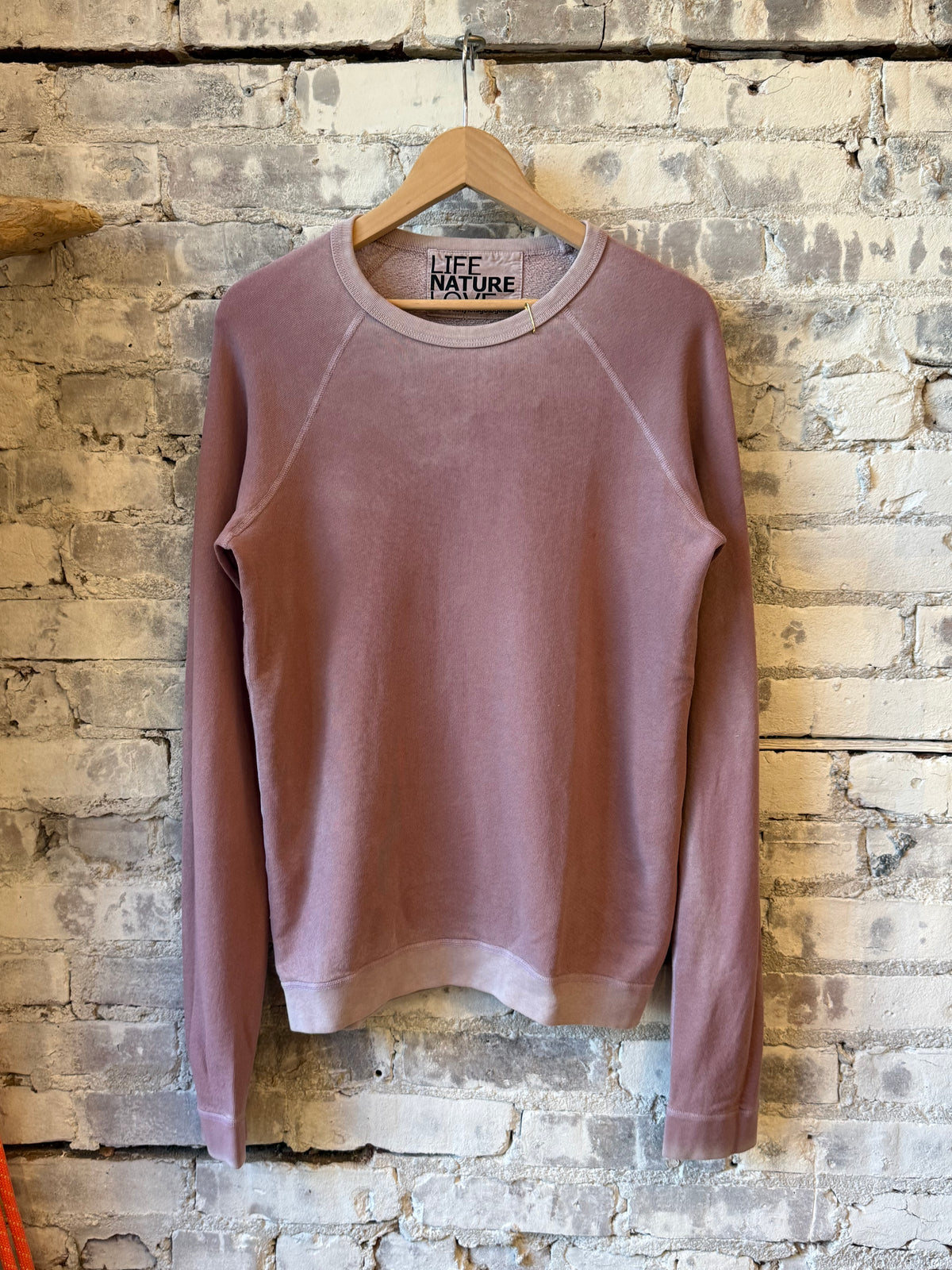 Women's Lucky Rabbits Sweatshirt by Freecity featuring a playful makeup rabbit design on soft fabric.