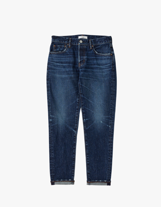 Women's Moussy Carroll Tapered Jean in dark blue denim, showing a close-up of the fitted waist and tapered leg style.