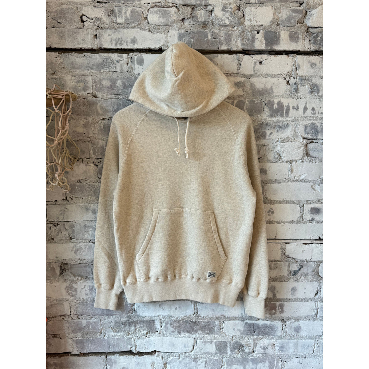 Men's Manchester 2 Pullover Hoodie by Kepani in oatmeal, showing the soft fabric and relaxed fit.