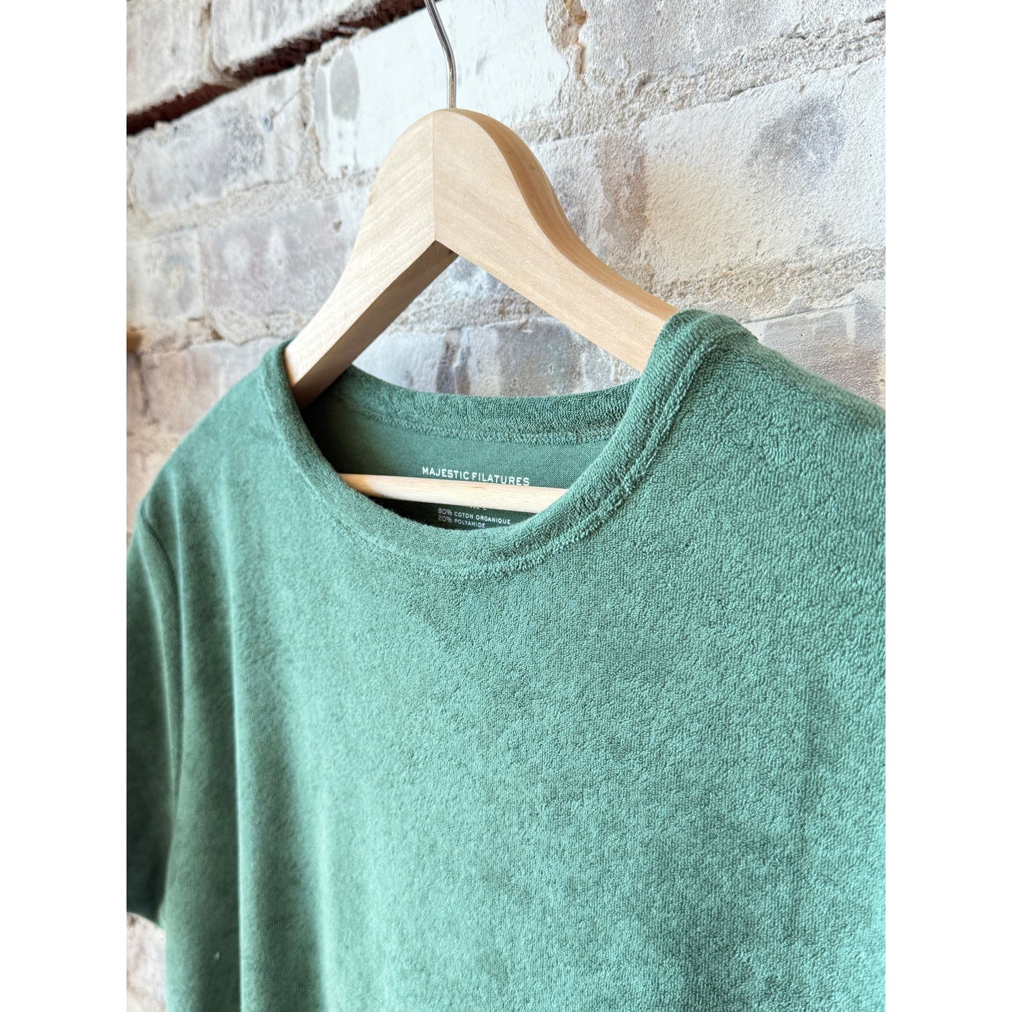 Women's organic cotton Terry semi-relaxed crewneck top in agave color by Majestic Filatures, showing the textured fabric and relaxed fit.