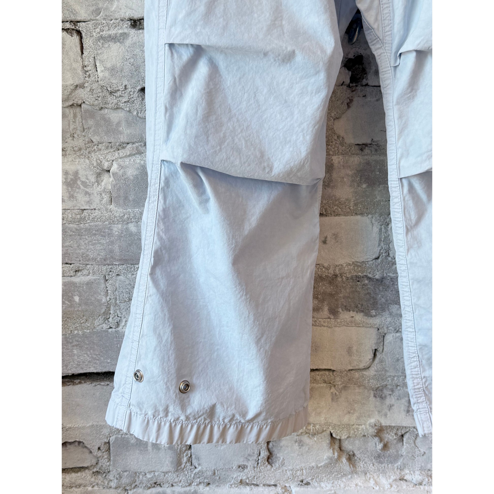 Women's Freecity Outofsight Poplin Air Flap Snap Kite Pant in blue plant with relaxed fit and stylish design.