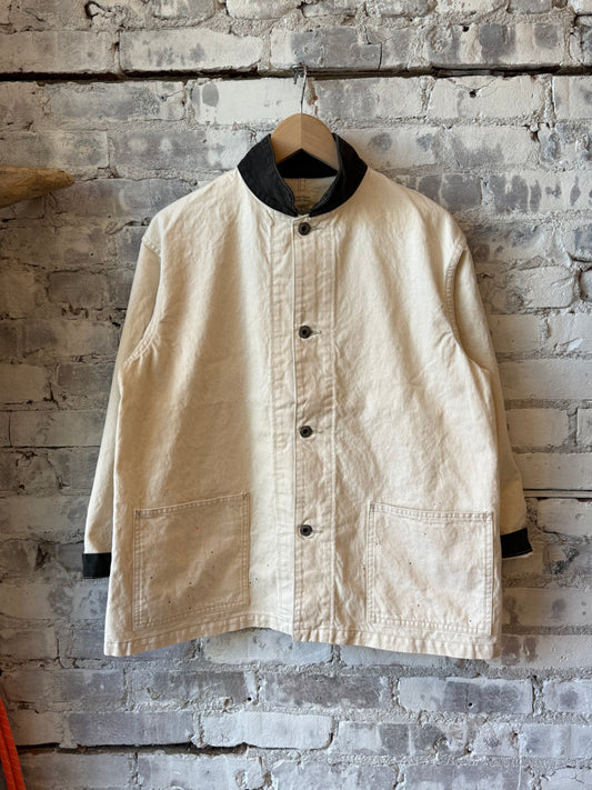 Unisex ivory twill engineer jacket with splatter design, men's style by Chimala, featuring a casual fit and detailed fabric texture.