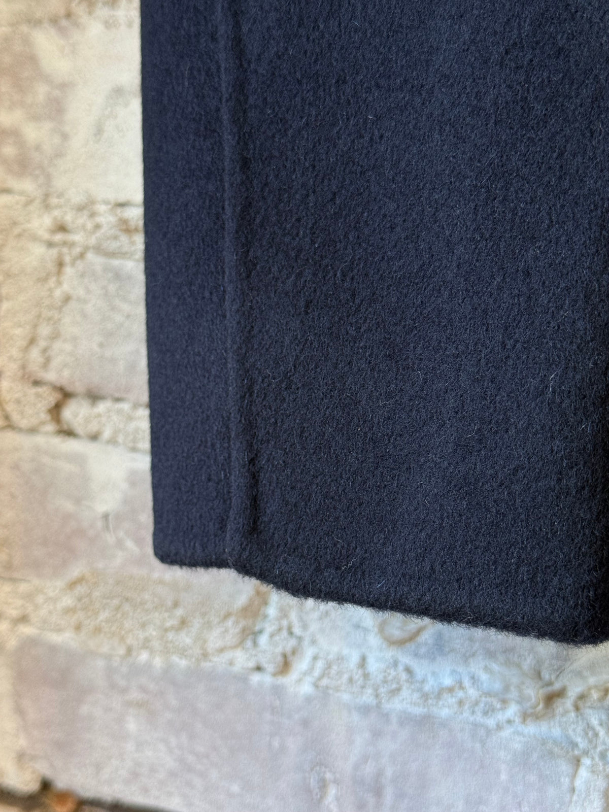 Hartford Men's Jojo Woven Navy Jacket with textured fabric and classic design, shown on a hanger.