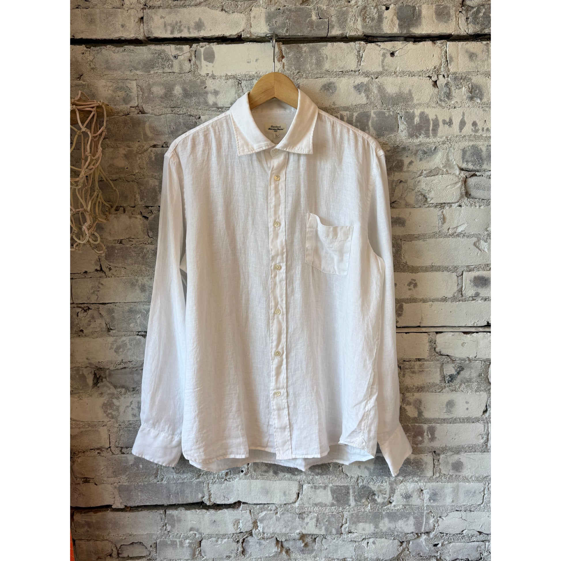 White men's woven shirt by Hartford Men's, featuring a classic button-up design and textured fabric.