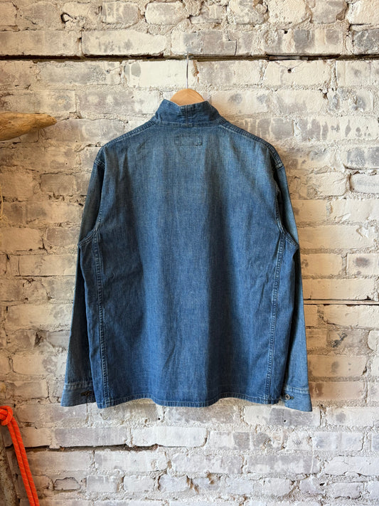 Unisex 8oz military denim work shirt in indigo by Chimala, featuring a classic rugged design, button-front, and chest pockets.
