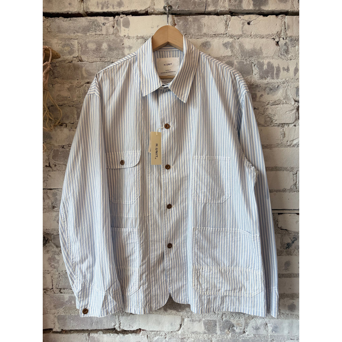 Men's blue Stripe Shirtalls by H-Unit, featuring a classic plaid pattern and button-up front, made from comfortable, durable fabric.