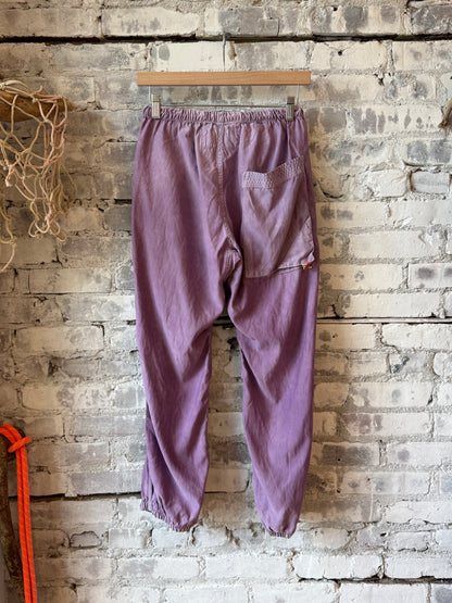 Women's Freecity Airjump Pant in matte satin, flap and snap-free design, in Bloom color, shown on a model.