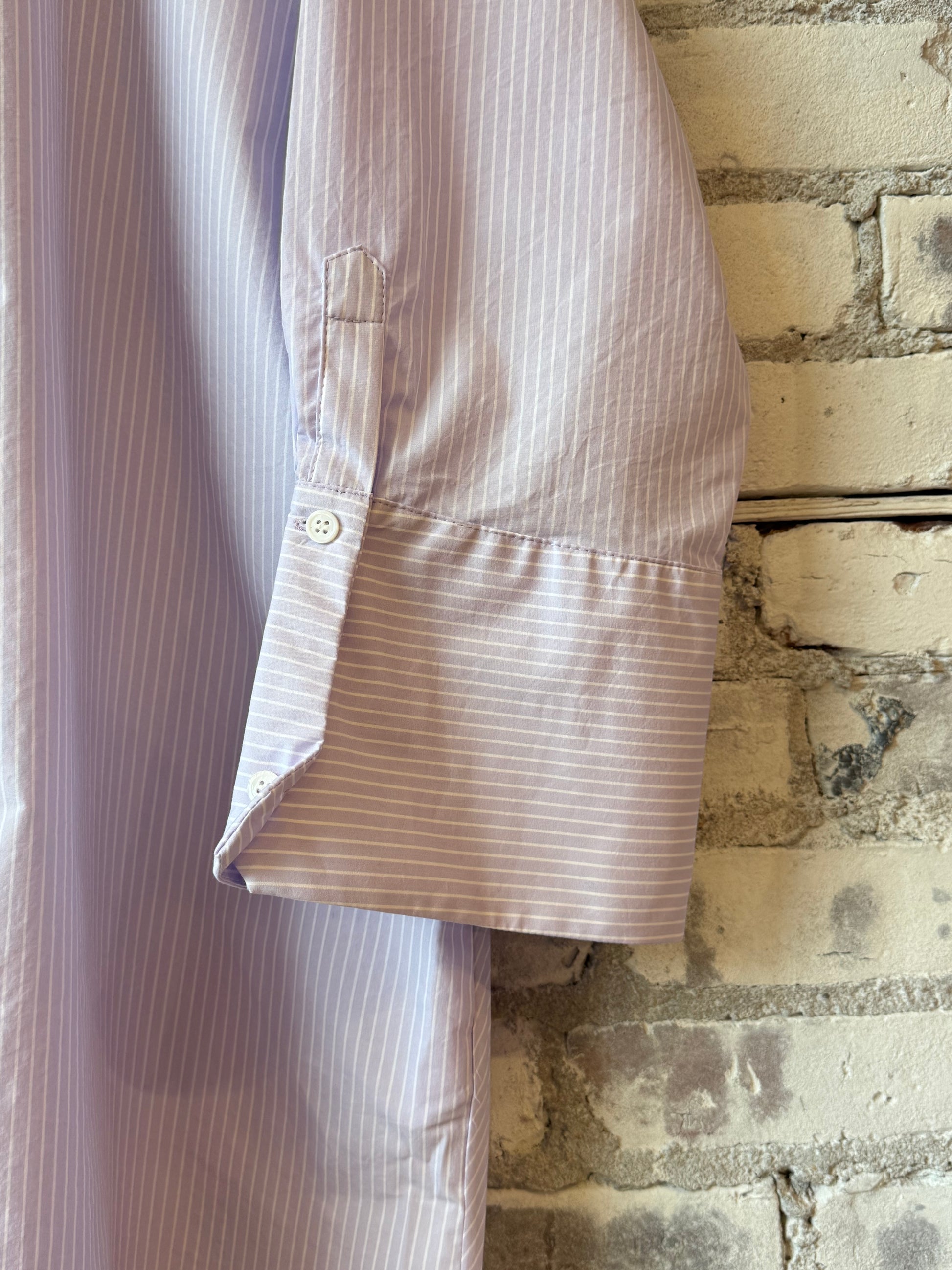 Women's Kelly Shirt Dress in lavender stripe by Secular, featuring a relaxed fit and classic collar, displayed on a model.