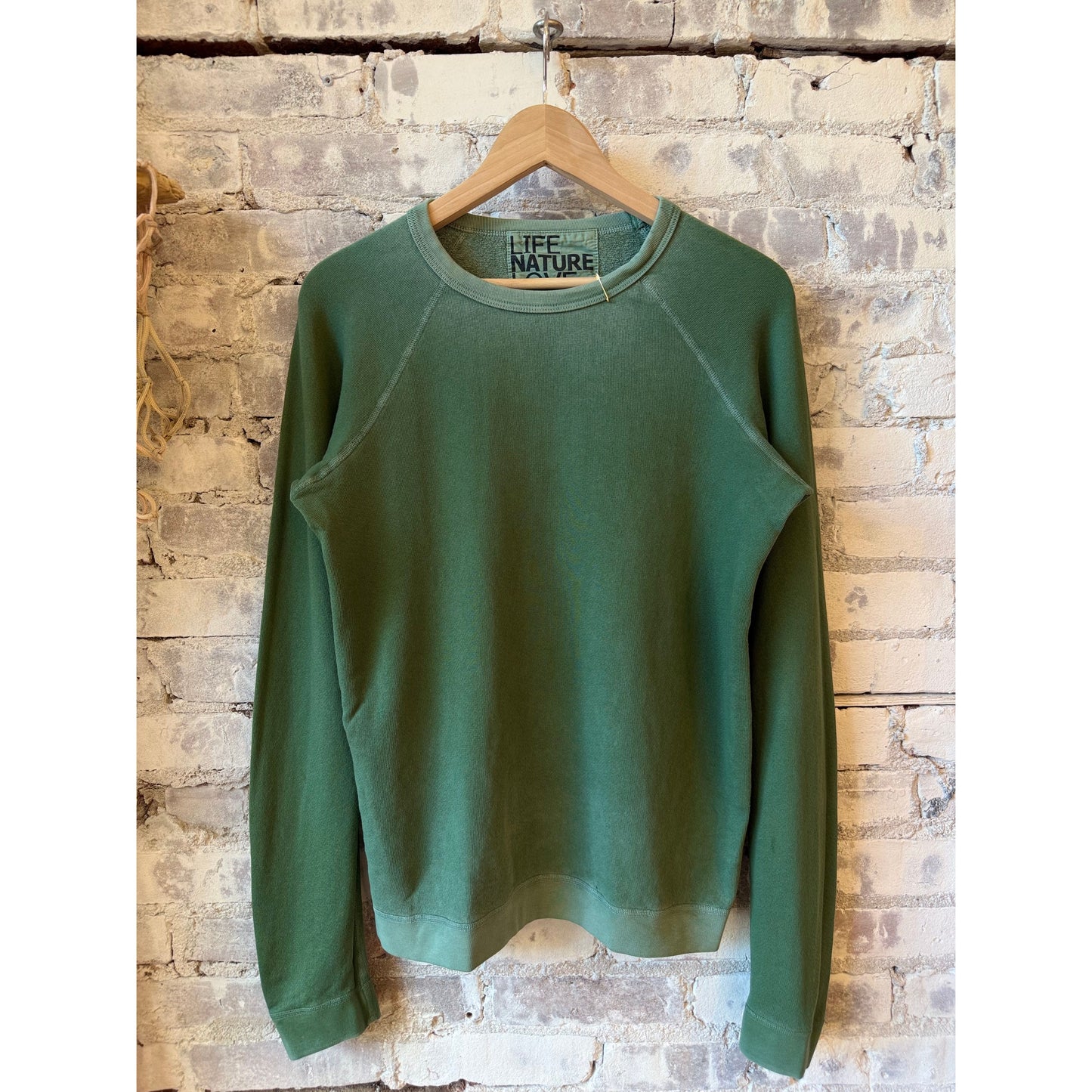 Women's Lucky Rabbits sweatshirt by Freecity featuring a playful Eatgreen Rabbit design on soft fabric.