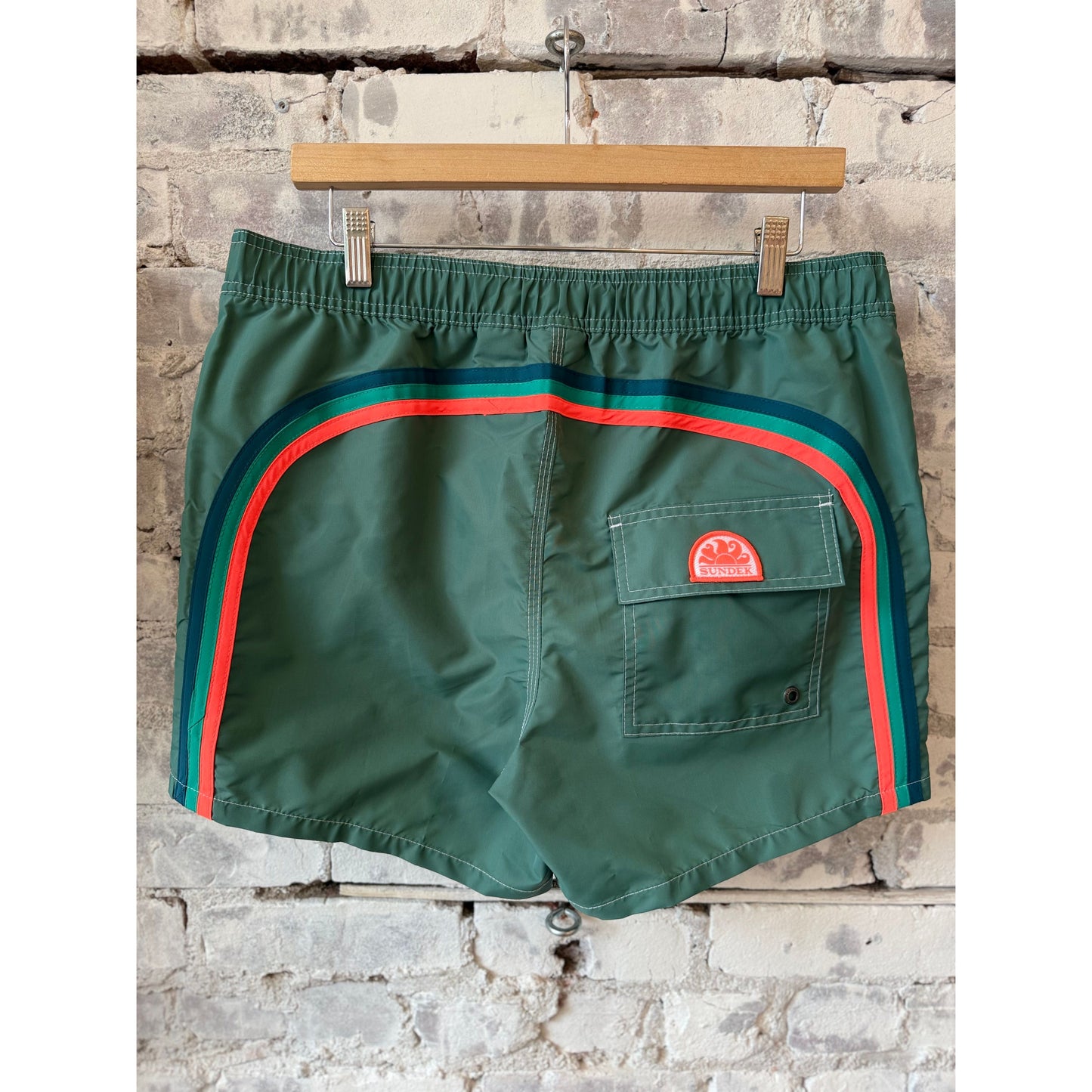 Men's Sundek Taffeta Semi-Elastic Waist Boardshort in camo green, showing the stylish waistband and durable fabric.