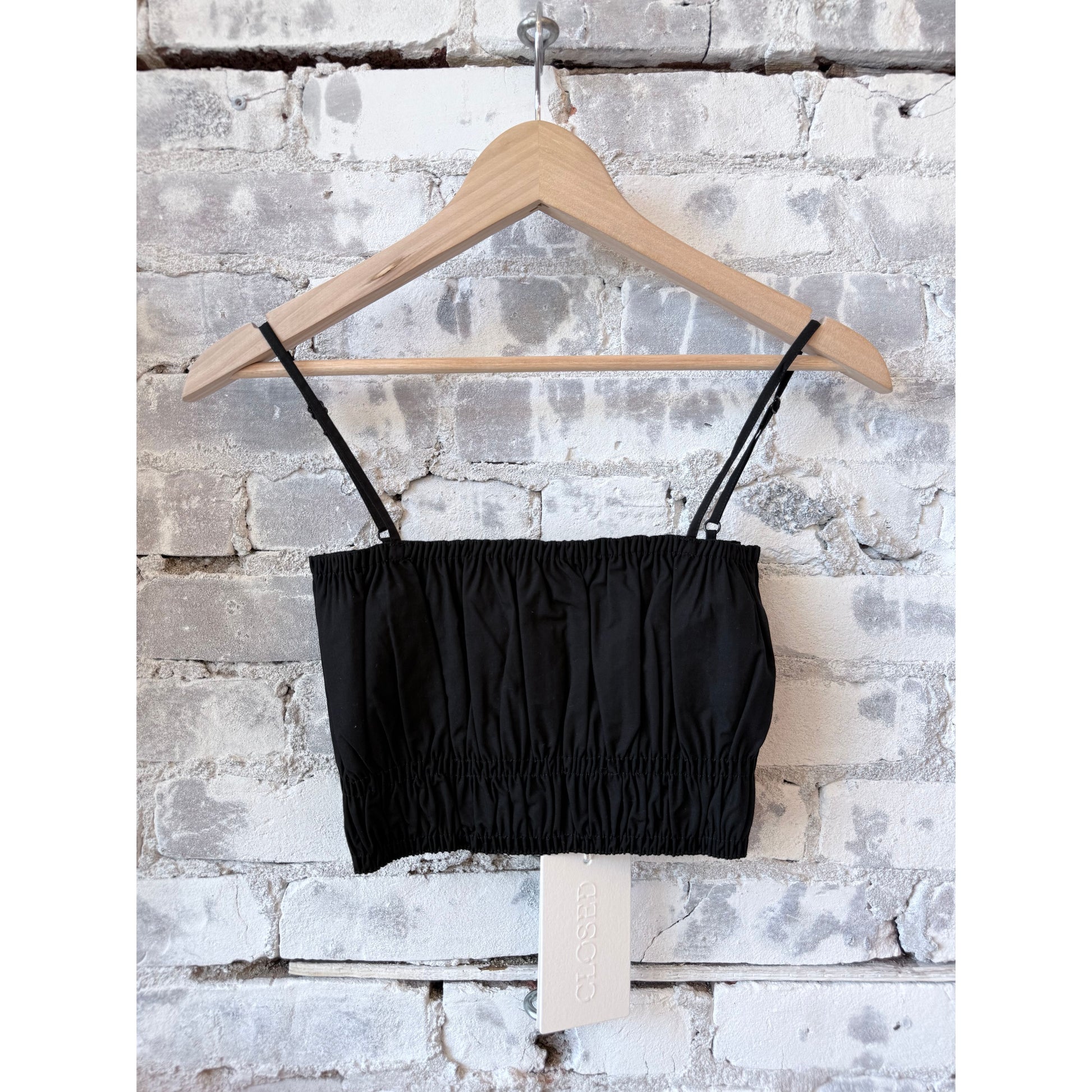 Black gathered top for women by Closed Women's, featuring a stylish, textured fabric with a relaxed fit and elegant design.